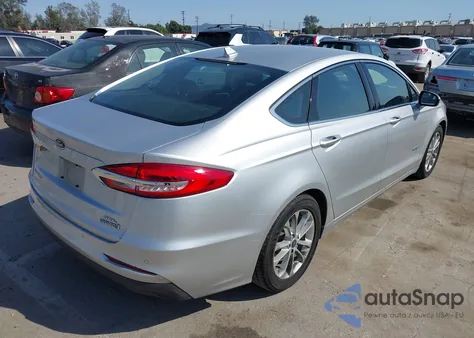 2019 Ford Fusion Hybrid Sel z USA, uszkodzony, nr VIN 3FA6P0MU8KR189542